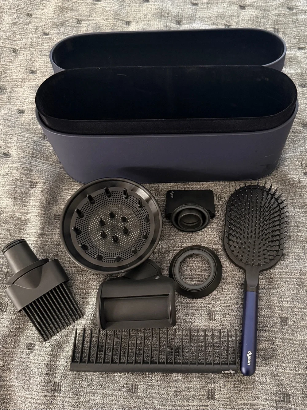 Dyson navy and black hair tool set with paddle brush and attachments